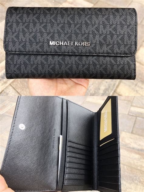 michael kors signature jet set wallet|bolso Michael Kors jet set.